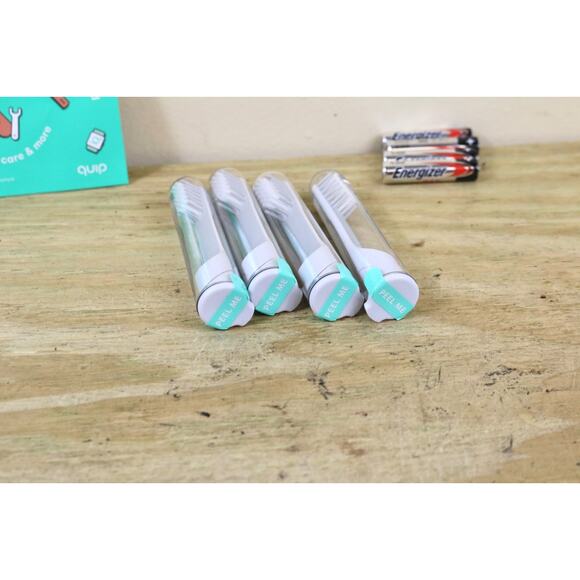 New Quip Electric Toothbrush Head Lot of 4 Refill Replacement 4 Batteries Sealed - Picture 2 of 3